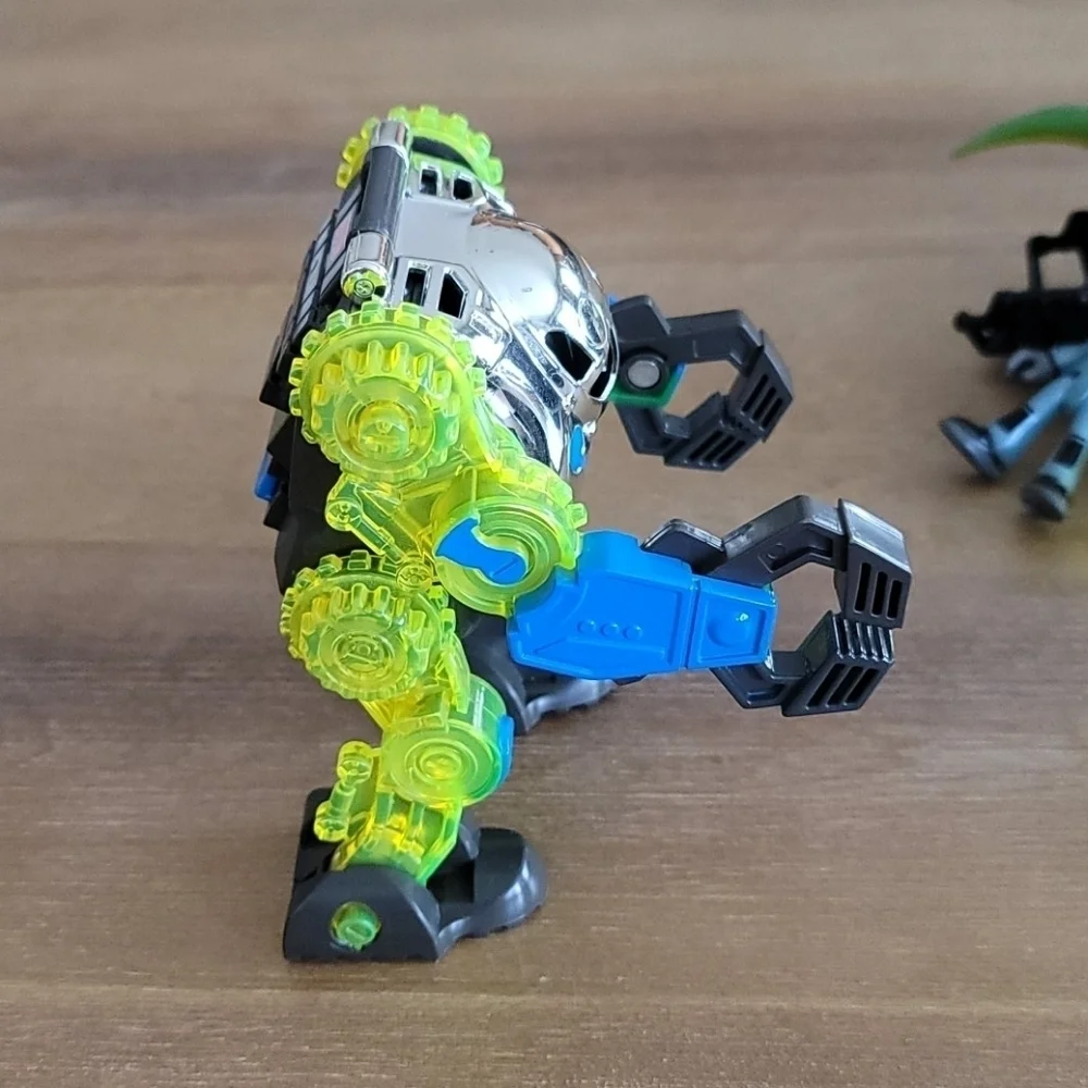 Fisher-Price Imaginext Raptor Doc & Exo Suit Dinosaur Figure Toy Set
